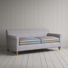 Angled view of the Ticking Blue Brown Idler sofa by NiX