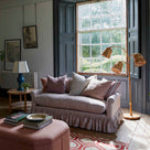  Curtain Call Sofa in Ticking Cotton, Berry, With NiX Cushions, Ottoman, Floor Lamp and a Side Table With Blue Base Lamp - NiX 