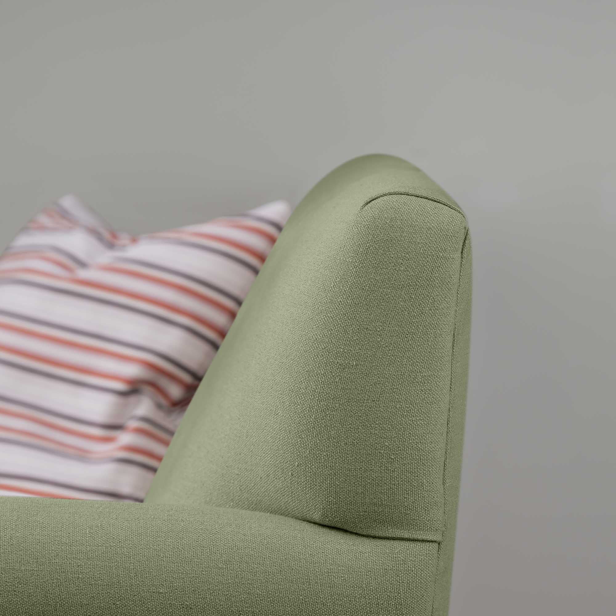  Elegant Backrest Design of the Idler 4-Seater Sofa in Laidback Linen Moss - Nicola Harding & Co. 