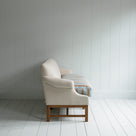  Side View of Front Row 3 Seater Upholstered Bench in Laidback Linen Dove Frame and Regatta Cotton Blue Seat -  By Nicola Harding & Co. 