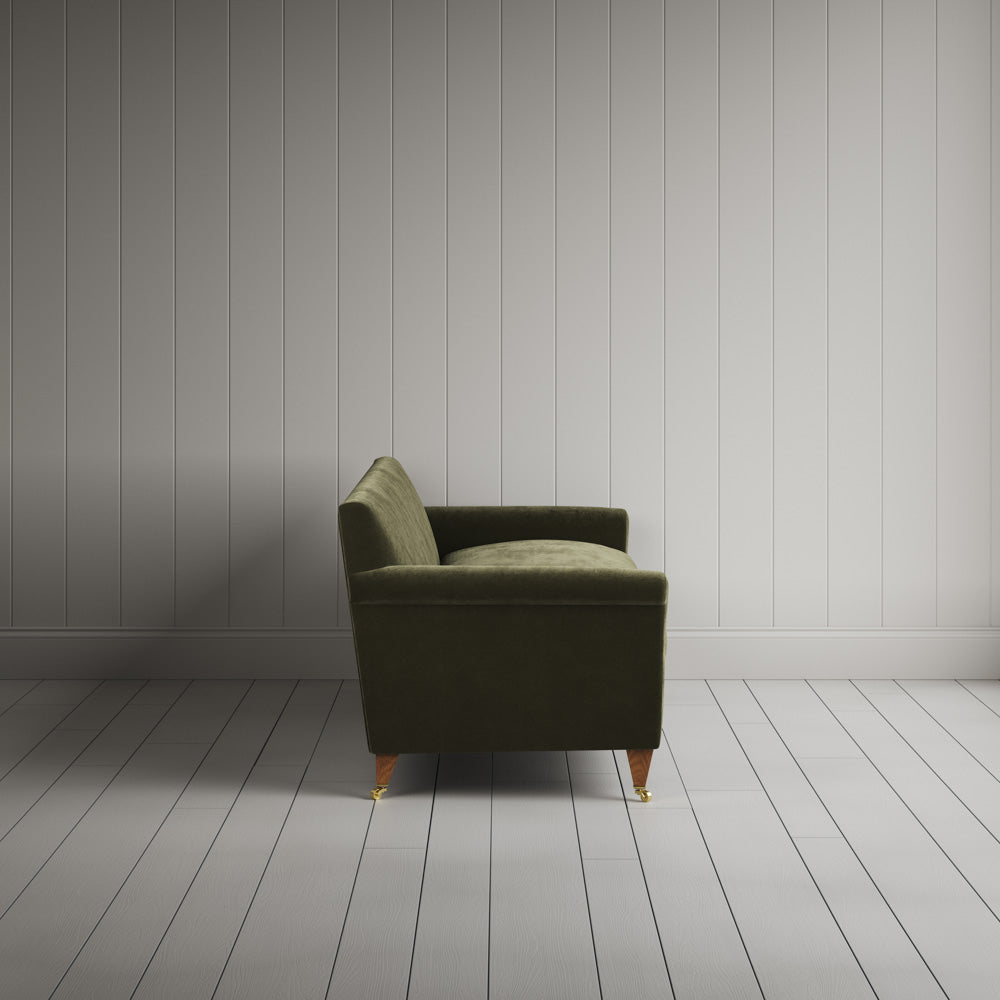 Side profile of 4 seater sofa in Caper Classic Corduroy, an olive green UK handmade product