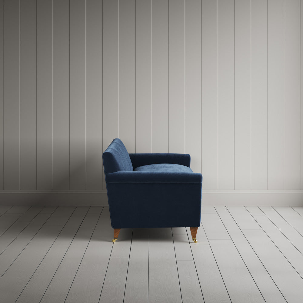  Side view of the Dark Blue corduroy Idler sofa - NiX By Nicola Harding & Co. 
