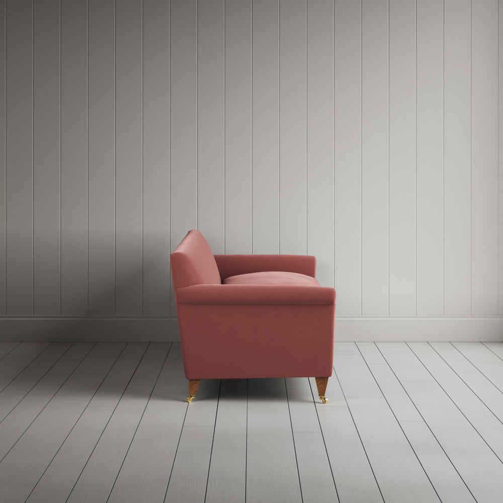 Side profile of Idler 4 seater sofa in Intelligent Velvet Damson