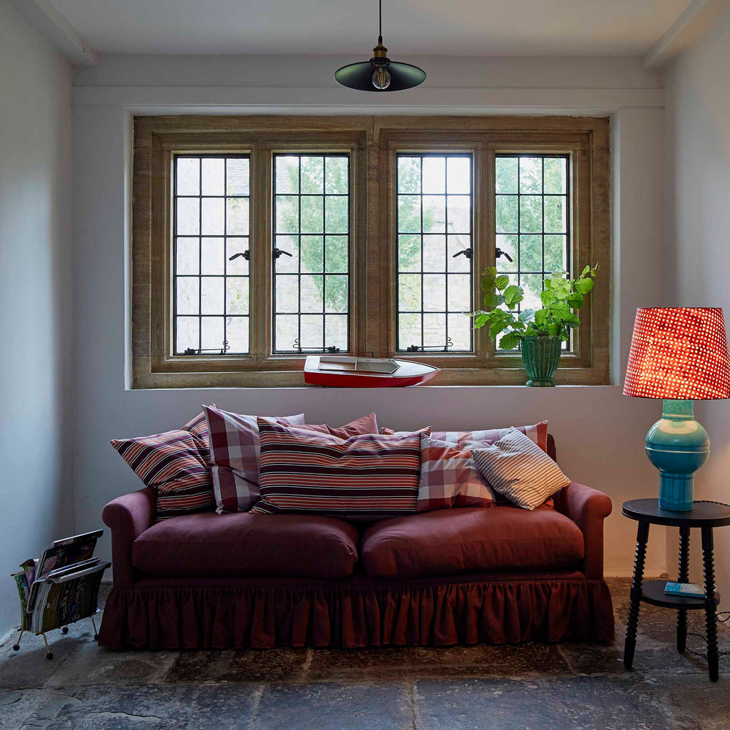  Curtain Call 4 Seater Sofa With NiX Square & Rectangle Cushions, and a Side Table With a Blue Base Lamp - NiX 