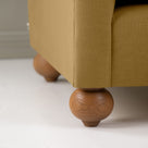  Dolittle 4 seater Sofa in Laidback Linen Ochre, Round Wooden Feet Closeup - Nicola Harding 
