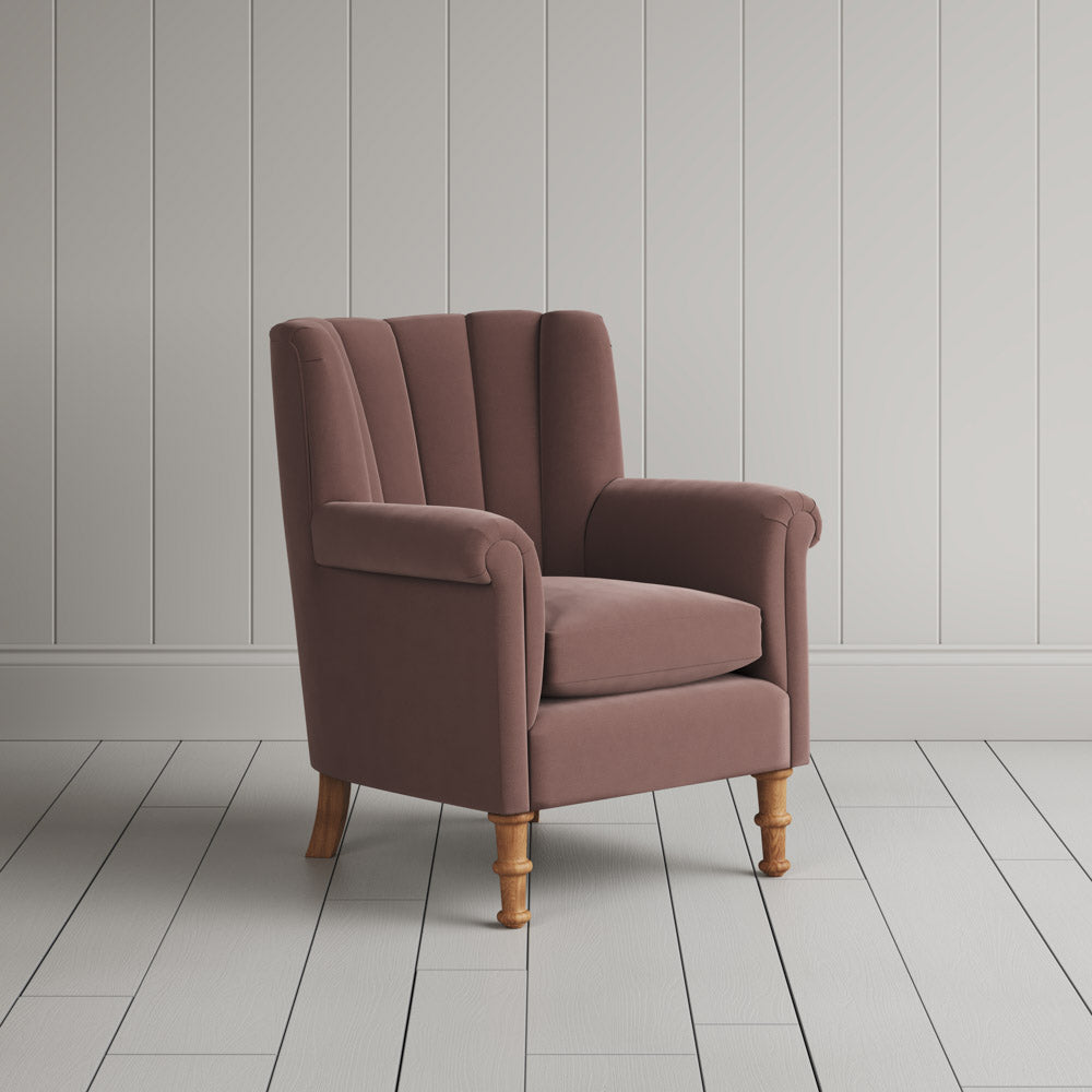  Time Out Armchair fluted back armchair in intelligent velvet dusky pink, angled view by NiX. 