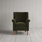 NiX furniture juniper velvet armchair with high fluted back, front studio shot.
