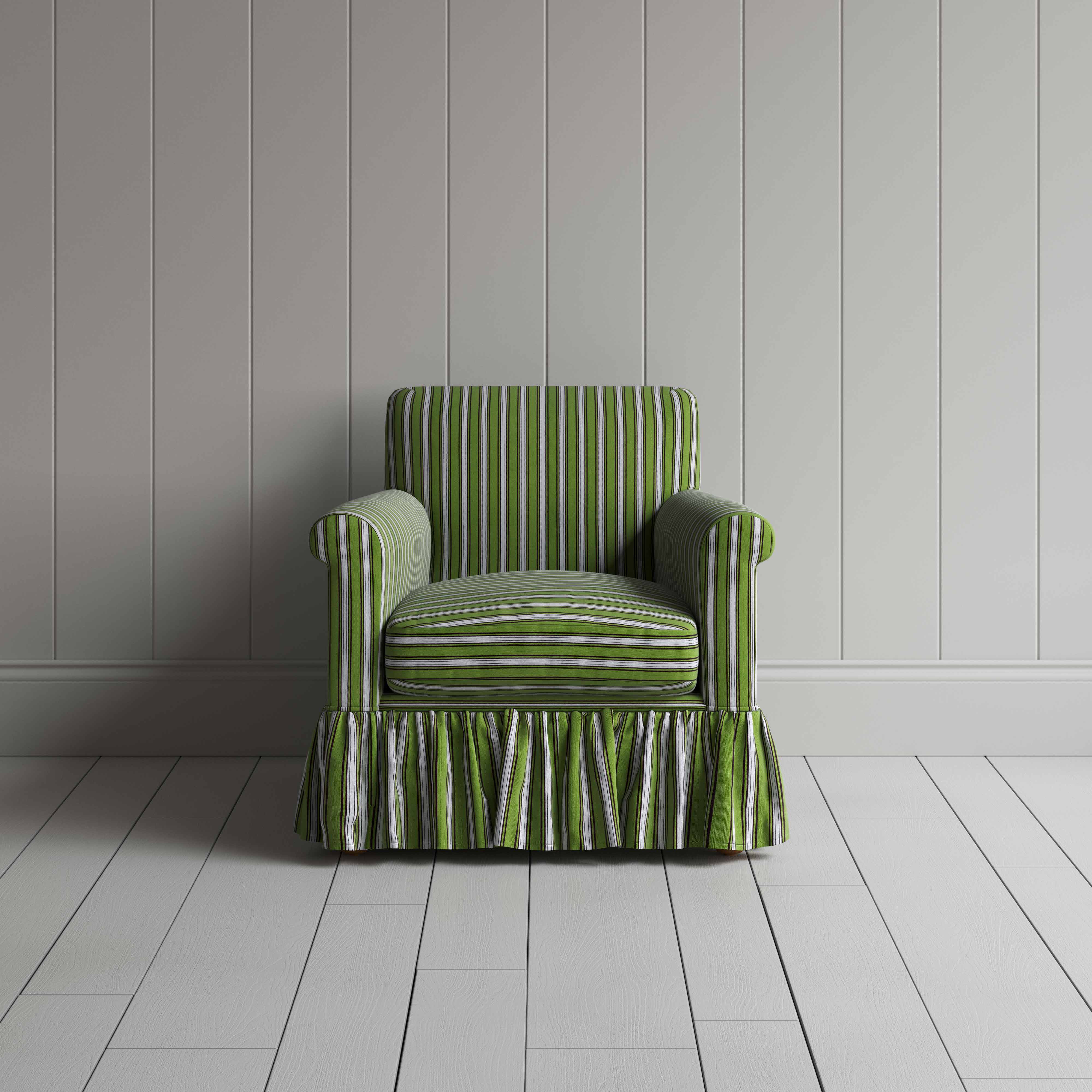  Elegant green and white striped armchair featuring a charming ruffled skirt, ideal for a stylish home decor. 