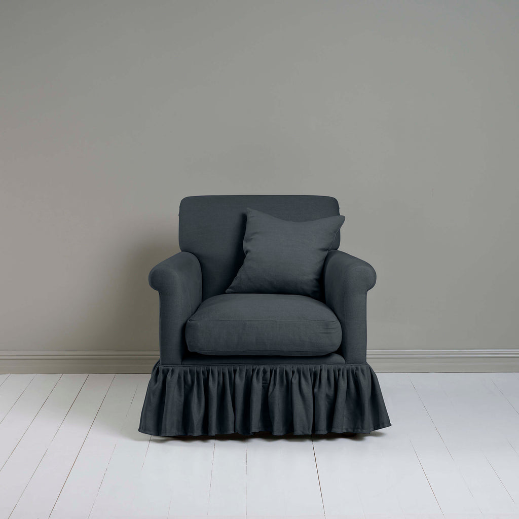  Curtain Call Armchair in Laidback Linen Midnight, With a Matching Square NiX Special Cushion from Front View - Nicola Harding 