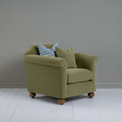  Dolittle Armchair in Intelligent Velvet Green Tea, In Side View With 1 Matching and 1 Slow Lane Cotton Linen, Blue Cushion - Nicola Harding 