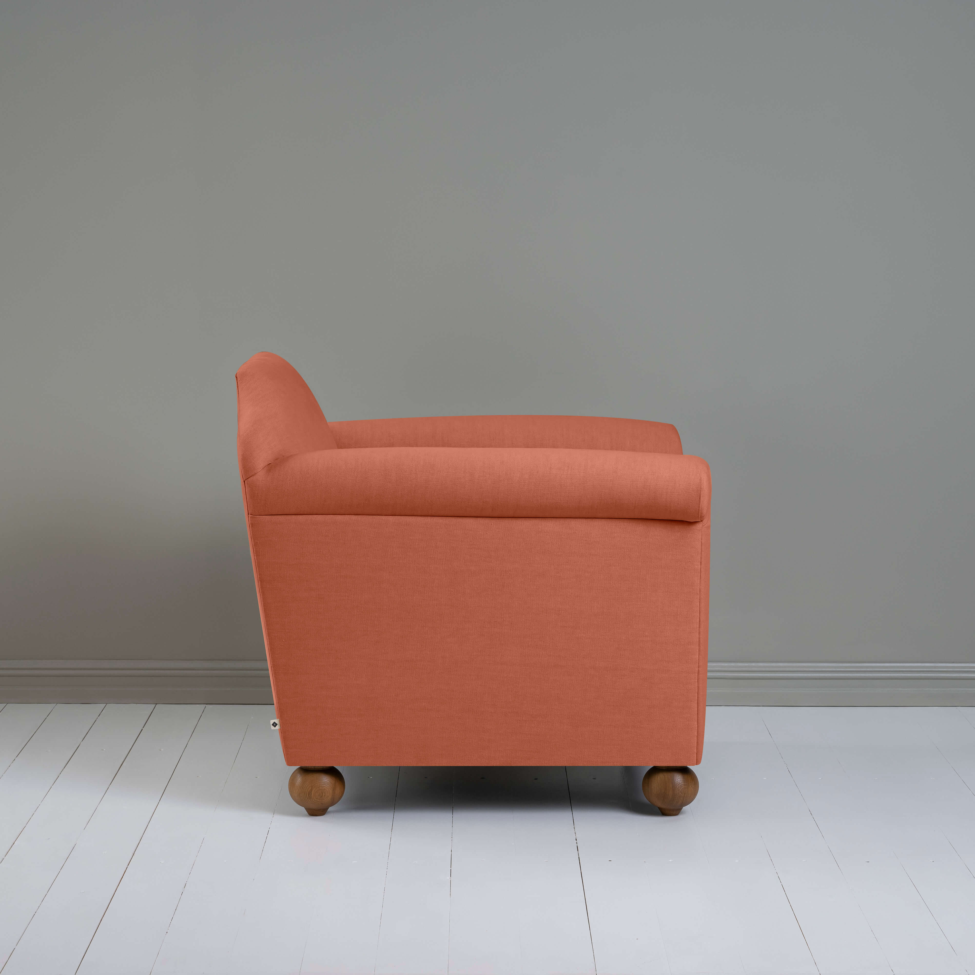  Dolittle Armchair in Laidback Linen Cayenne, Side View - Nicola Harding 