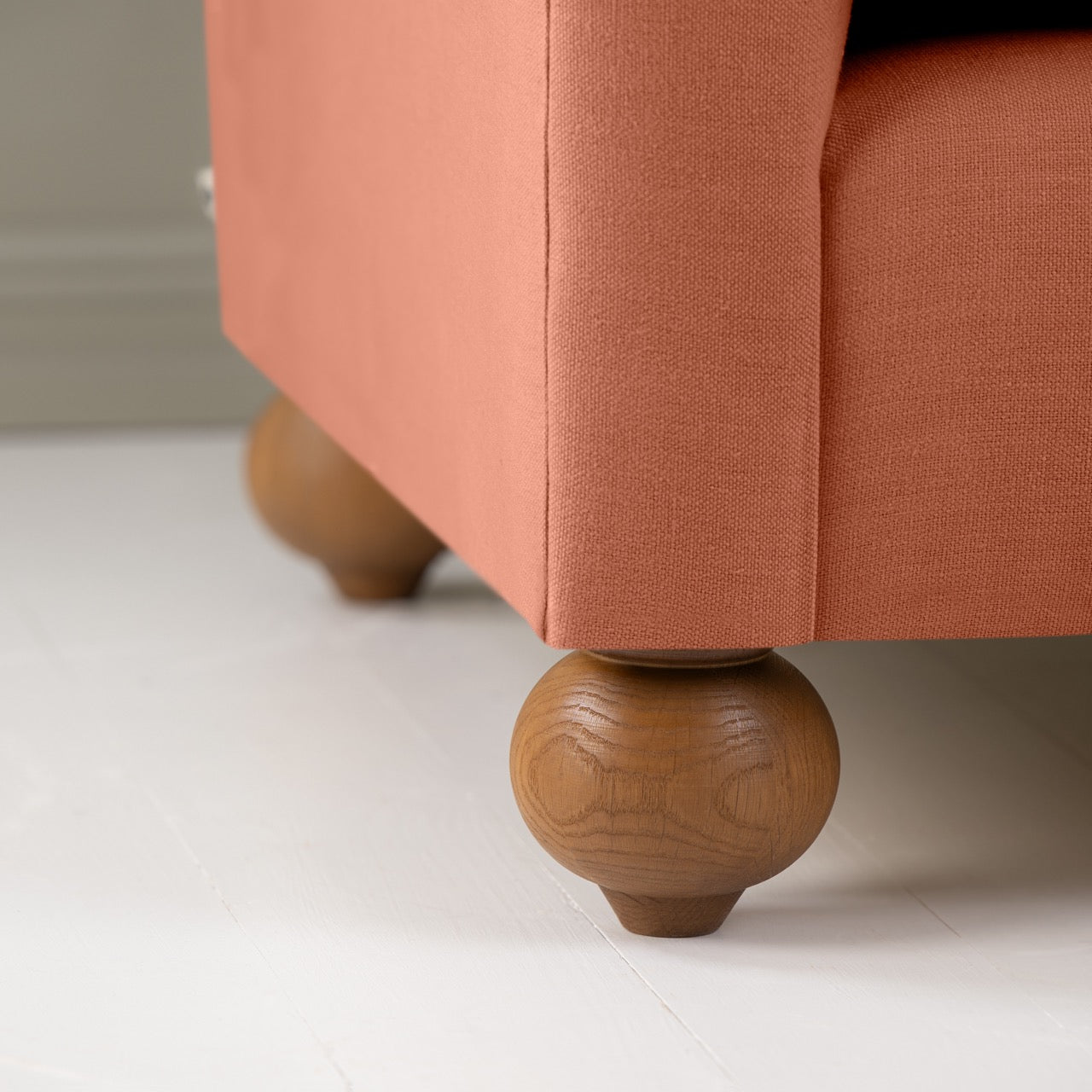  Dolittle Armchair in Laidback Linen Cayenne, Round Wooden Foot Closeup - Nicola Harding 