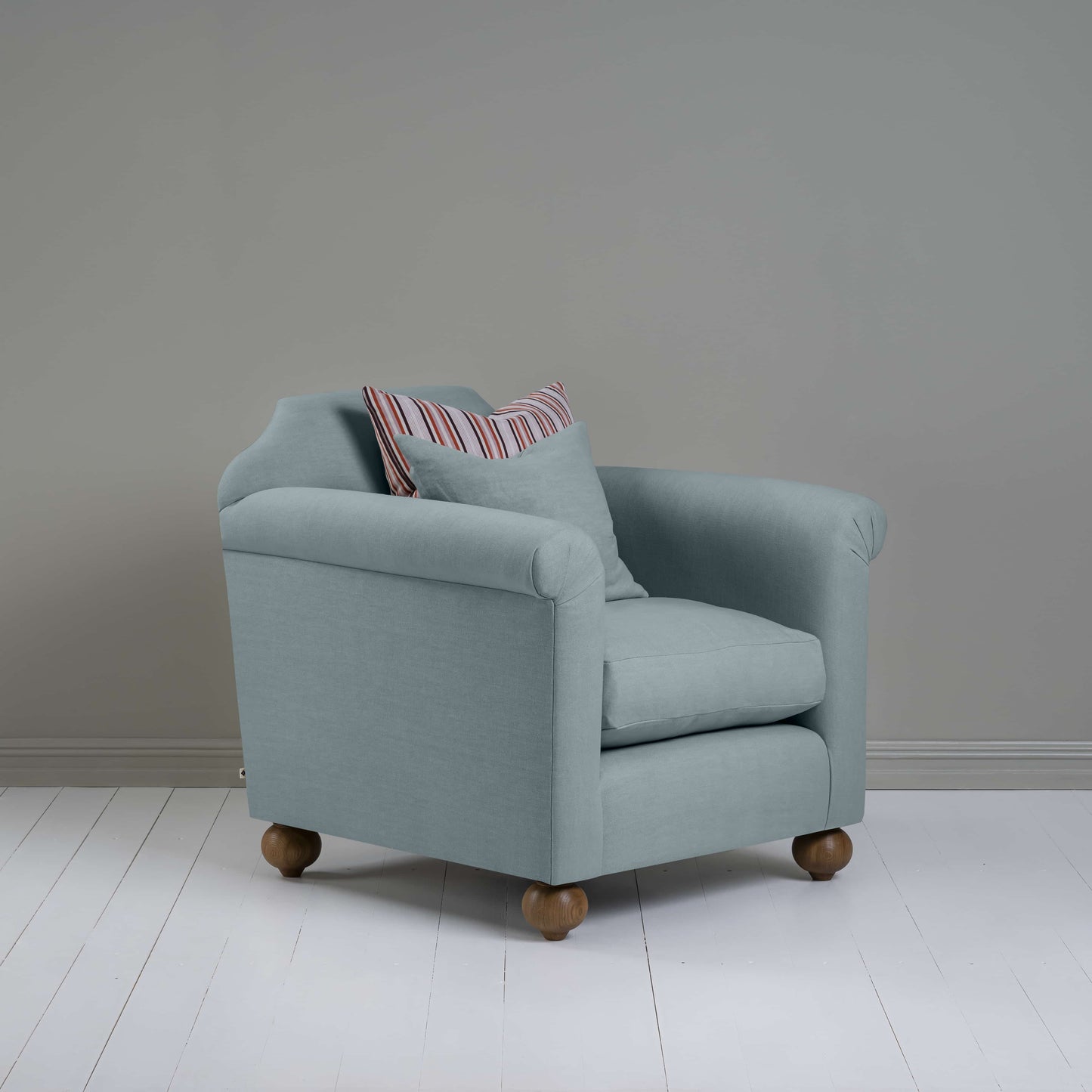 Dolittle Armchair in Laidback Linen Cerulean, With Side View and 2 NiX Cushions - Nicola Harding