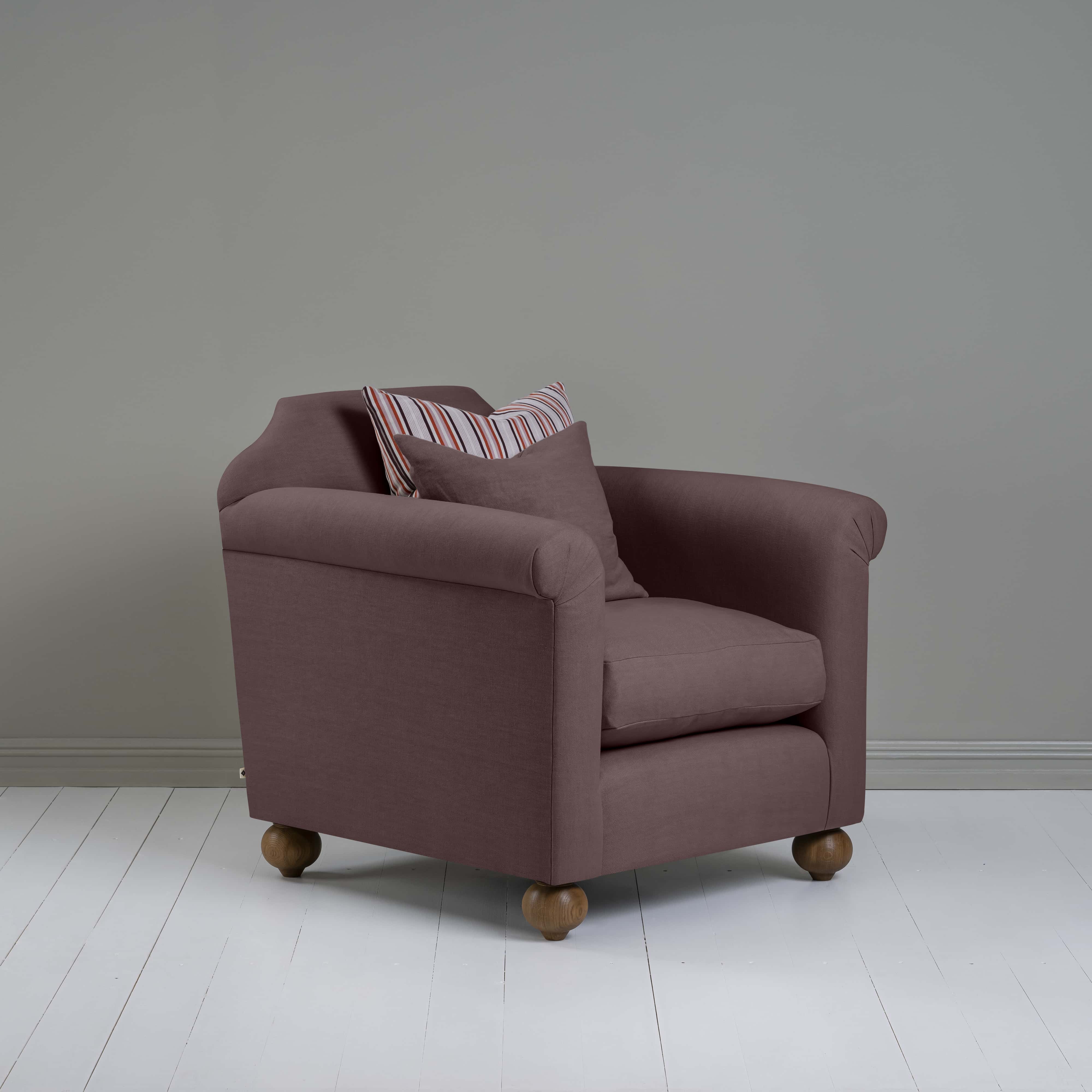  Dolittle Armchair in Laidback Linen Damson, Side View With 2 NiX Special Cushions - Nicola Harding 