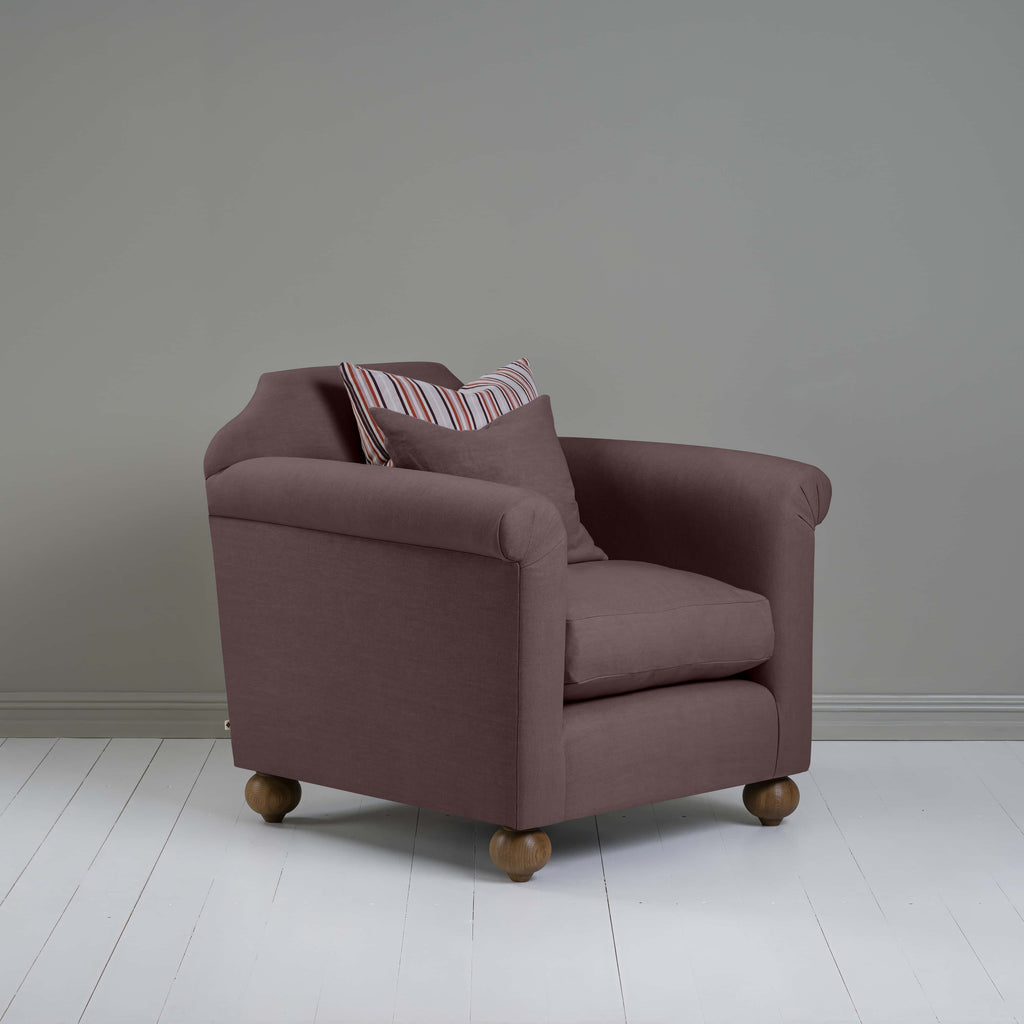  Dolittle Armchair in Laidback Linen Damson, Side View With 2 NiX Special Cushions - Nicola Harding 