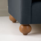 Dolittle Armchair in Laidback Linen Midnight, Round Wooden Foot Closeup - Nicola Harding 