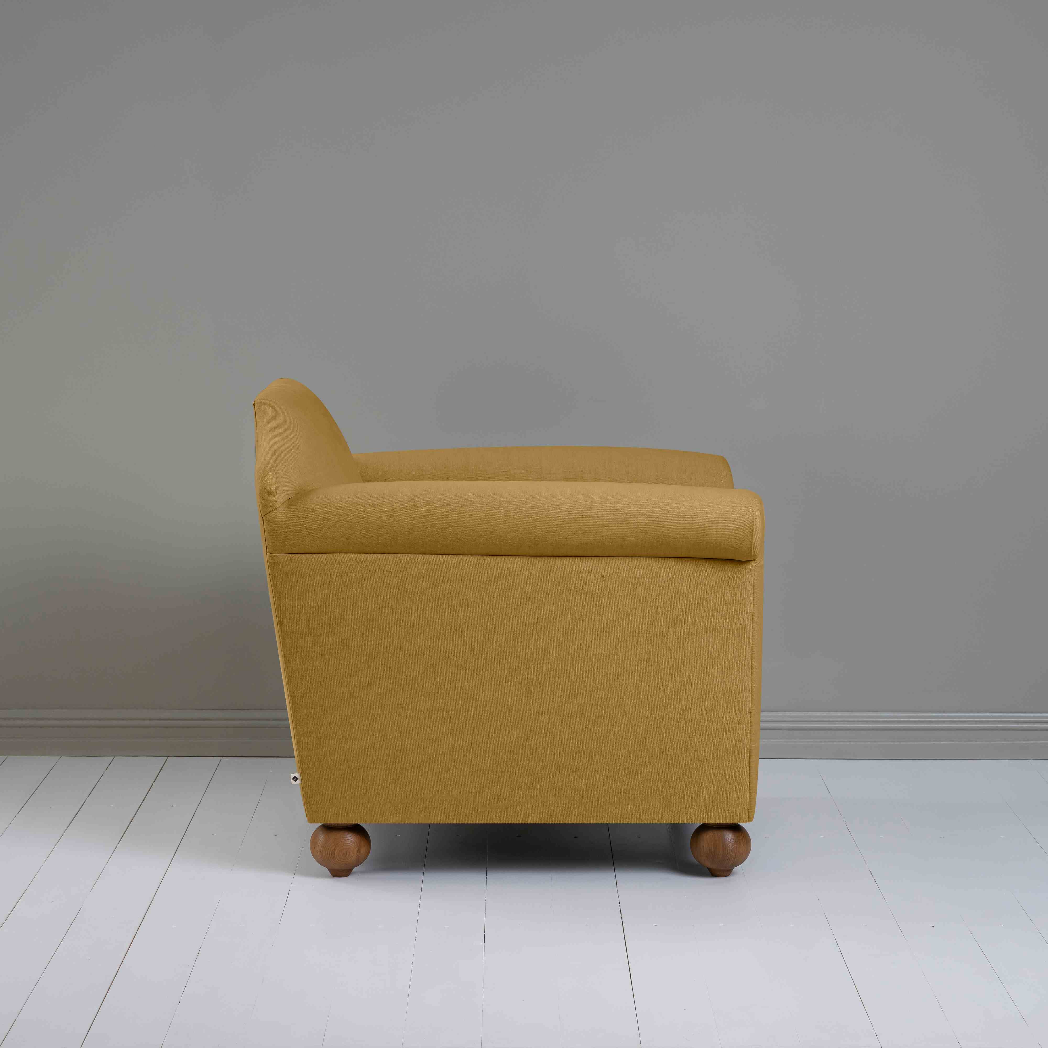  Dolittle Armchair in Laidback Linen Ochre, Side View - Nicola Harding 