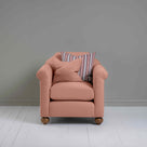  The front view of the Dolittle Armchair in Laidback Linen Roseberry features one matching cushion and one contrasting cushion – Nicola Harding. 