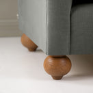  Dolittle Armchair in Laidback Linen Shadow, Round Wooden Foot Closeup - Nicola Harding 