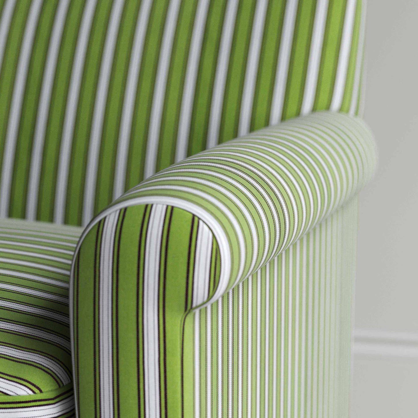 Detailed view of a green and white striped sofa.