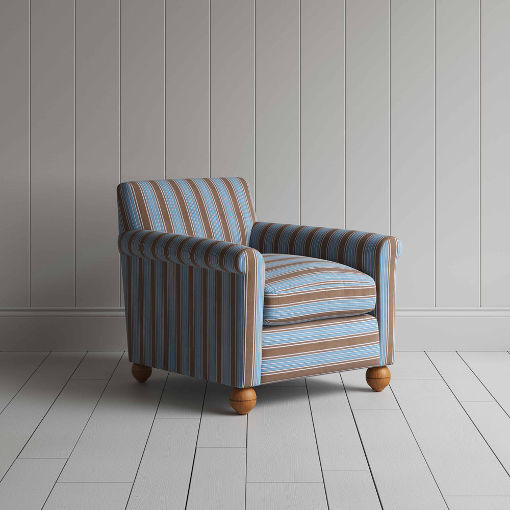  A chair with blue and white stripes and wooden legs. 
