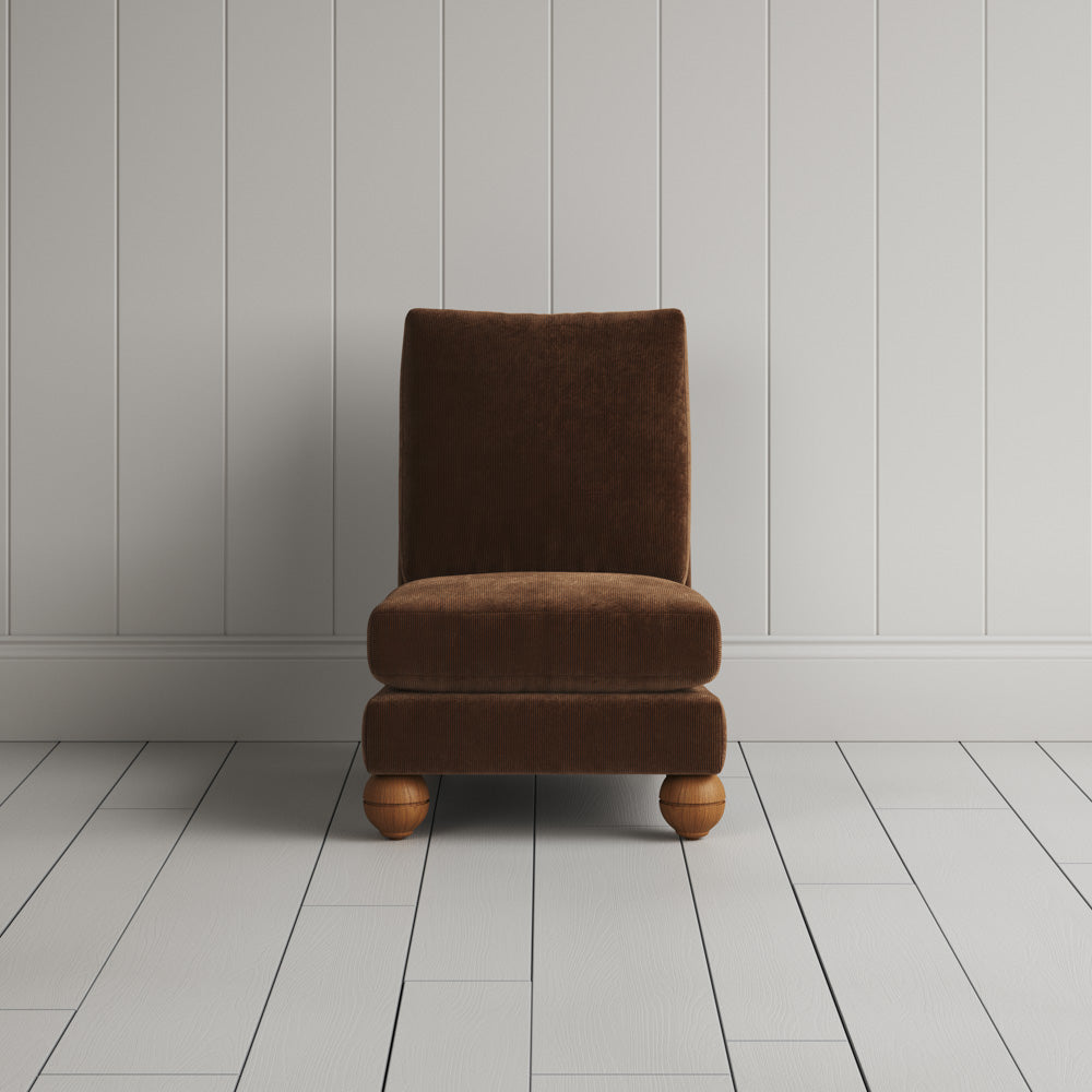  Front view of the Tobacco corduroy Perch chair, a perfect chair for a fireplace or bedroom. 