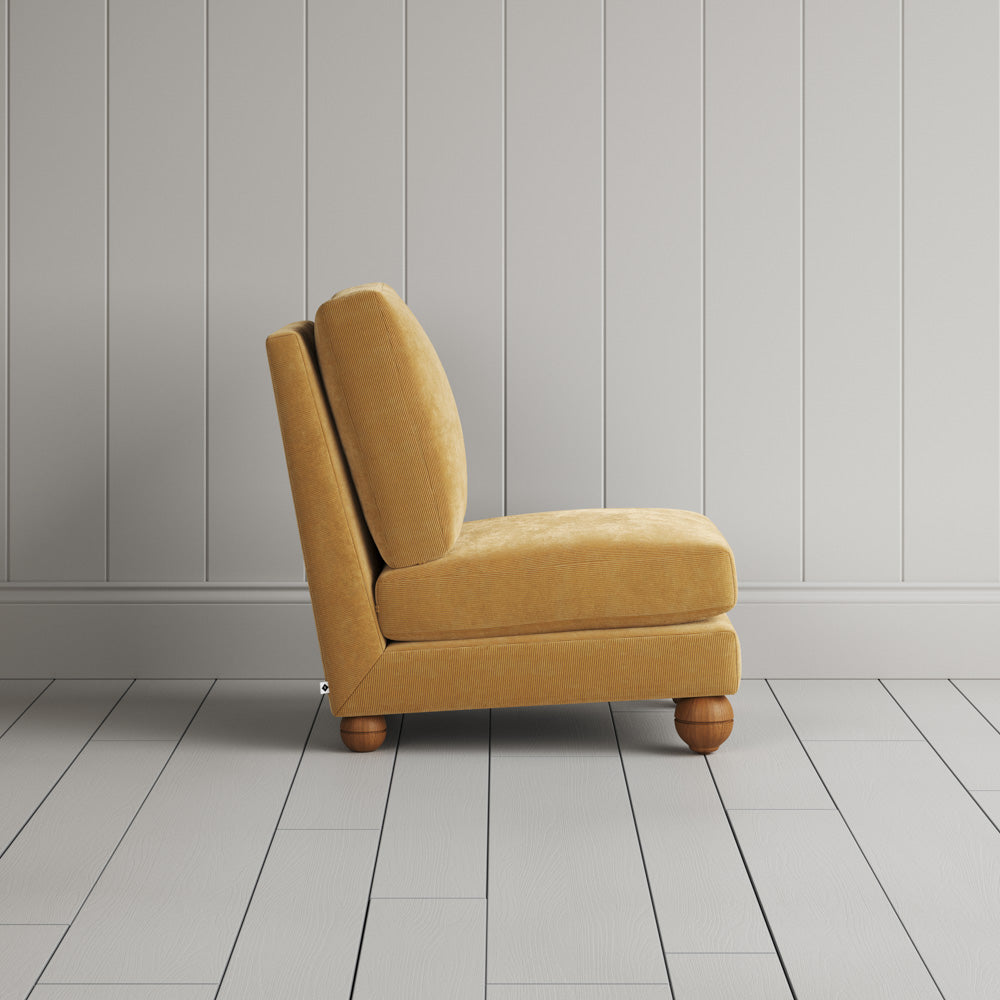  Side silhouette of the Perch slipper chair in Wheat corduroy, ideal for small cozy spaces. 