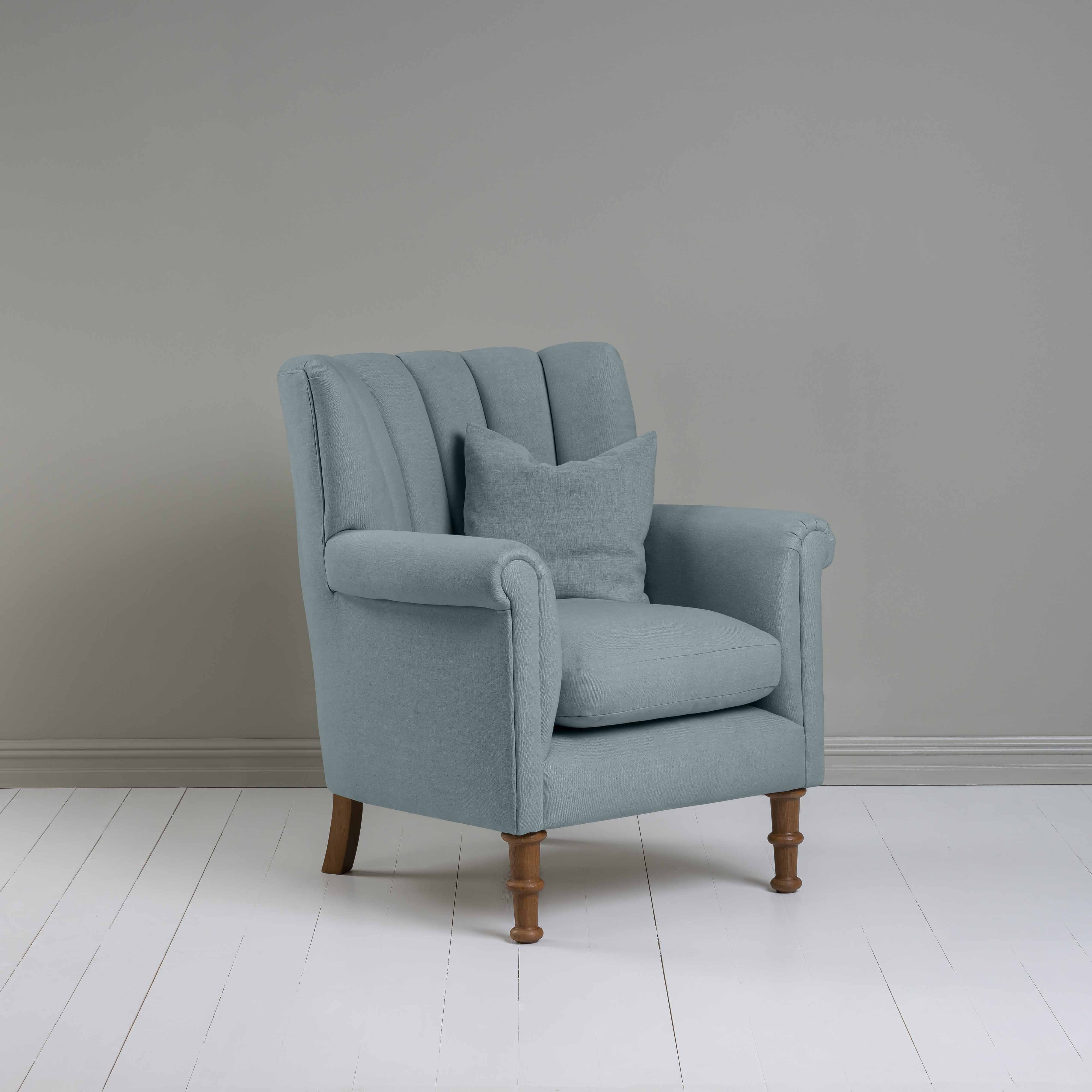  Time Out Armchair in Laidback Linen Cerulean, Side View With Matching Cushion - NiX 