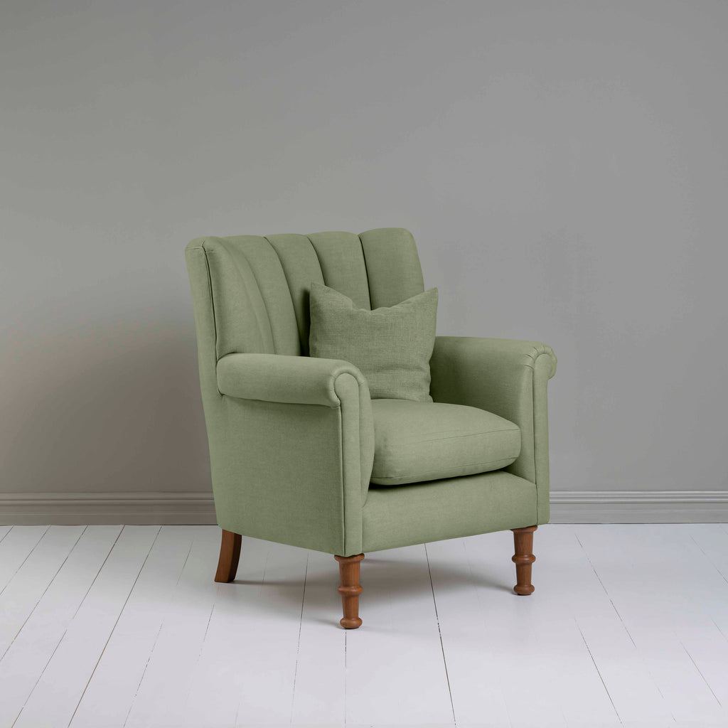  Time Out Armchair in Laidback Linen Moss, Side View With Matching Cushion - NiX 