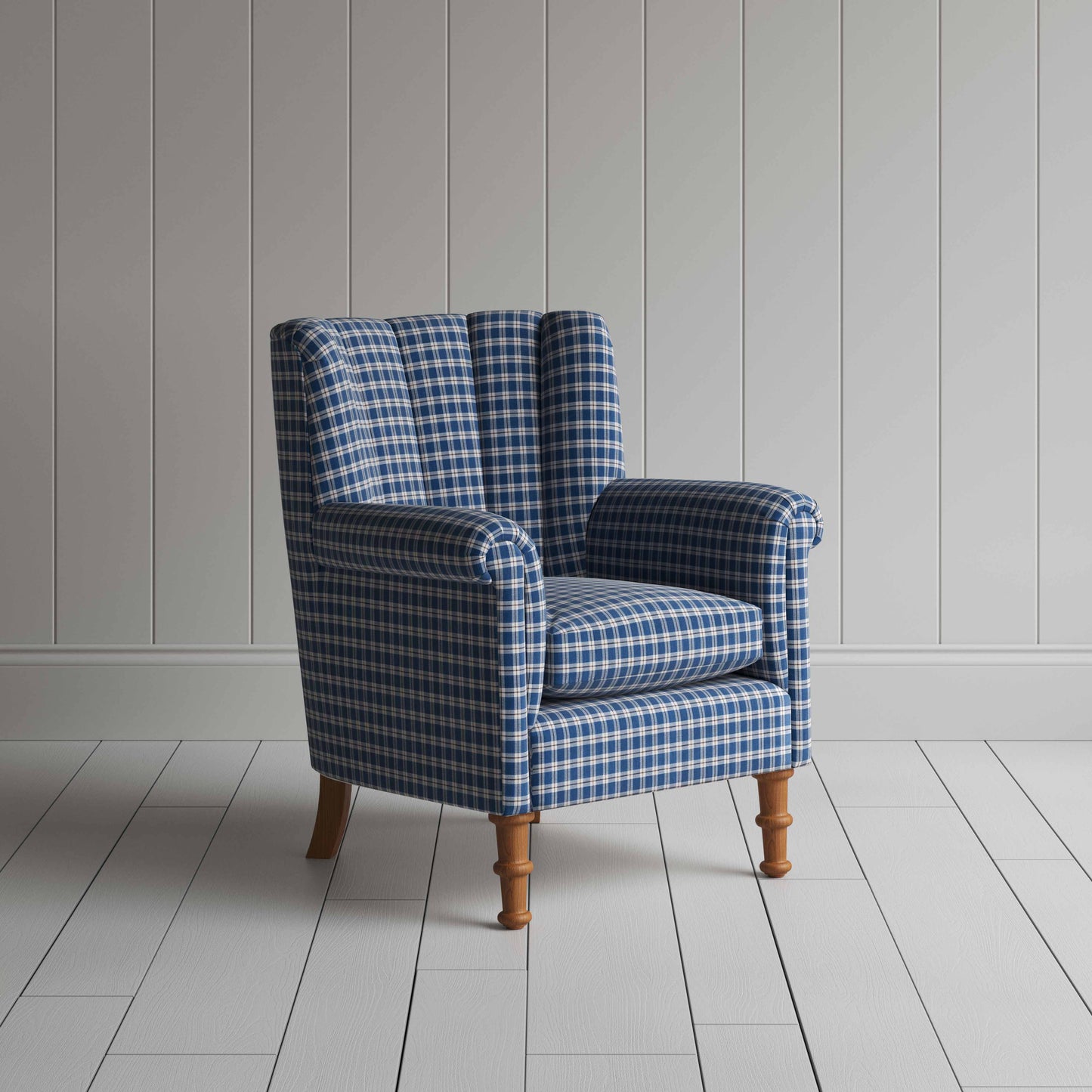 Blue and white checkered armchair, adding a touch of elegance and comfort to any living space.