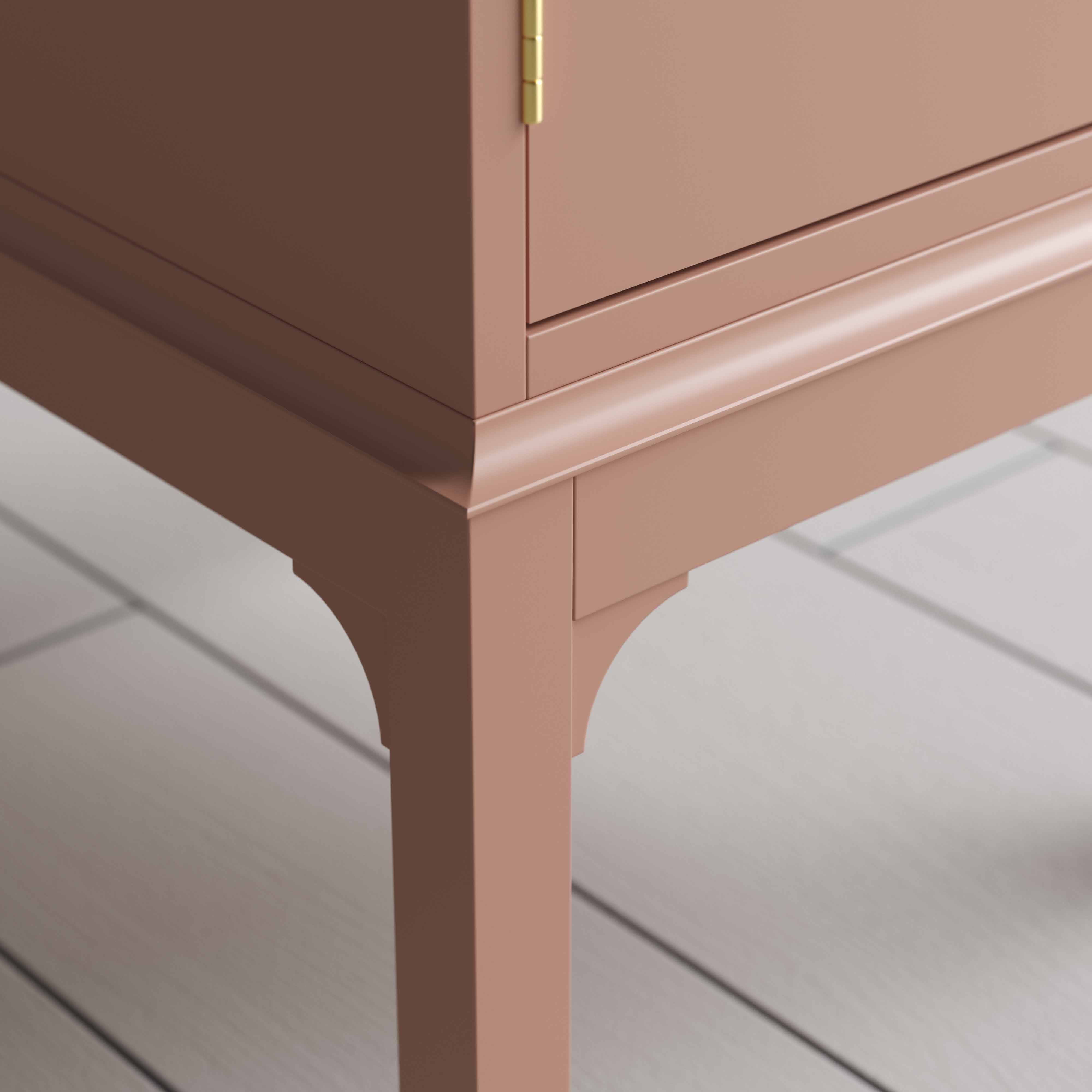  Edge Design close up of a small pink bedside table with a side door, perfect for storing items  