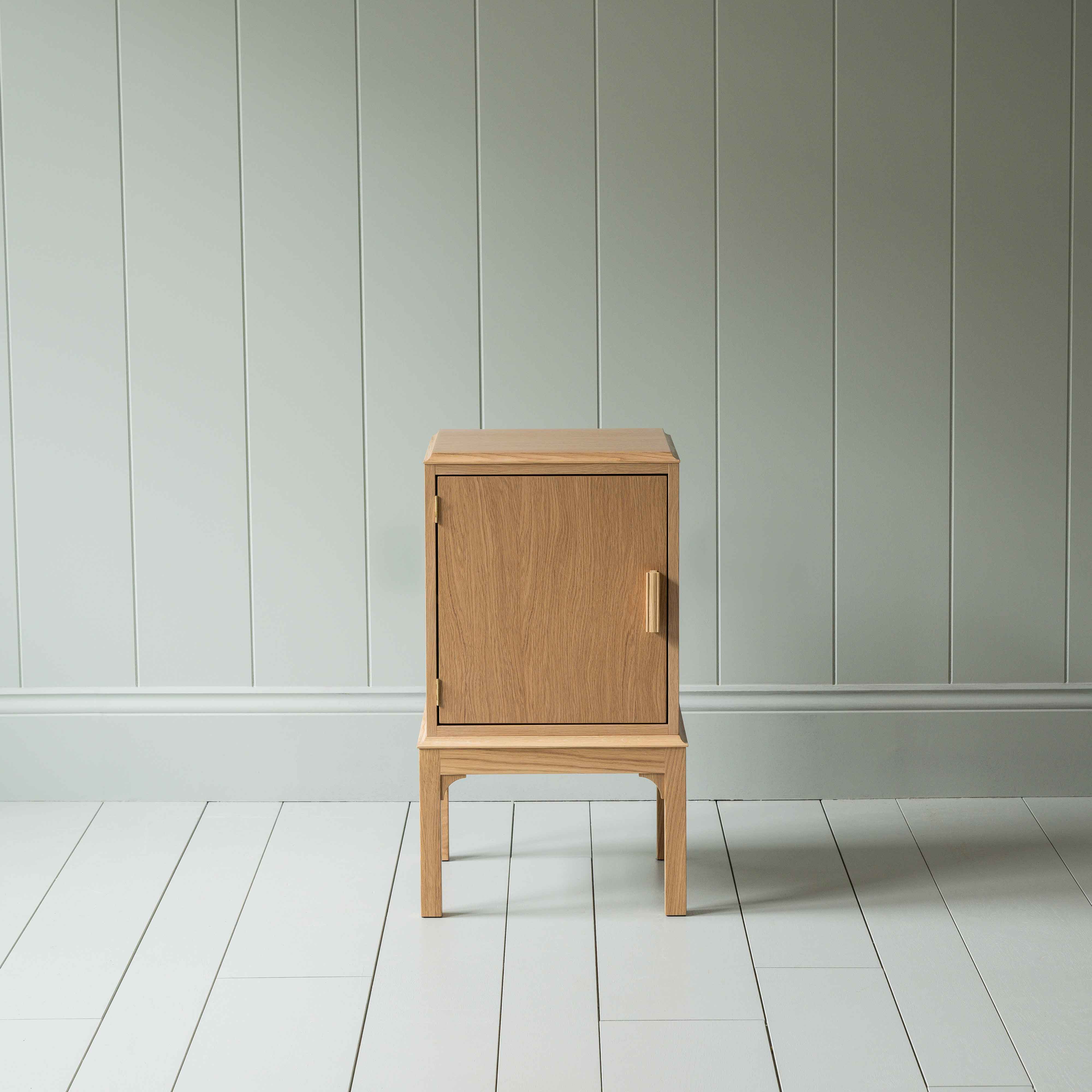  Front View of Bits and Bobs Bedside Table, Natural Oak, Left Hand Side - Nicola Harding 