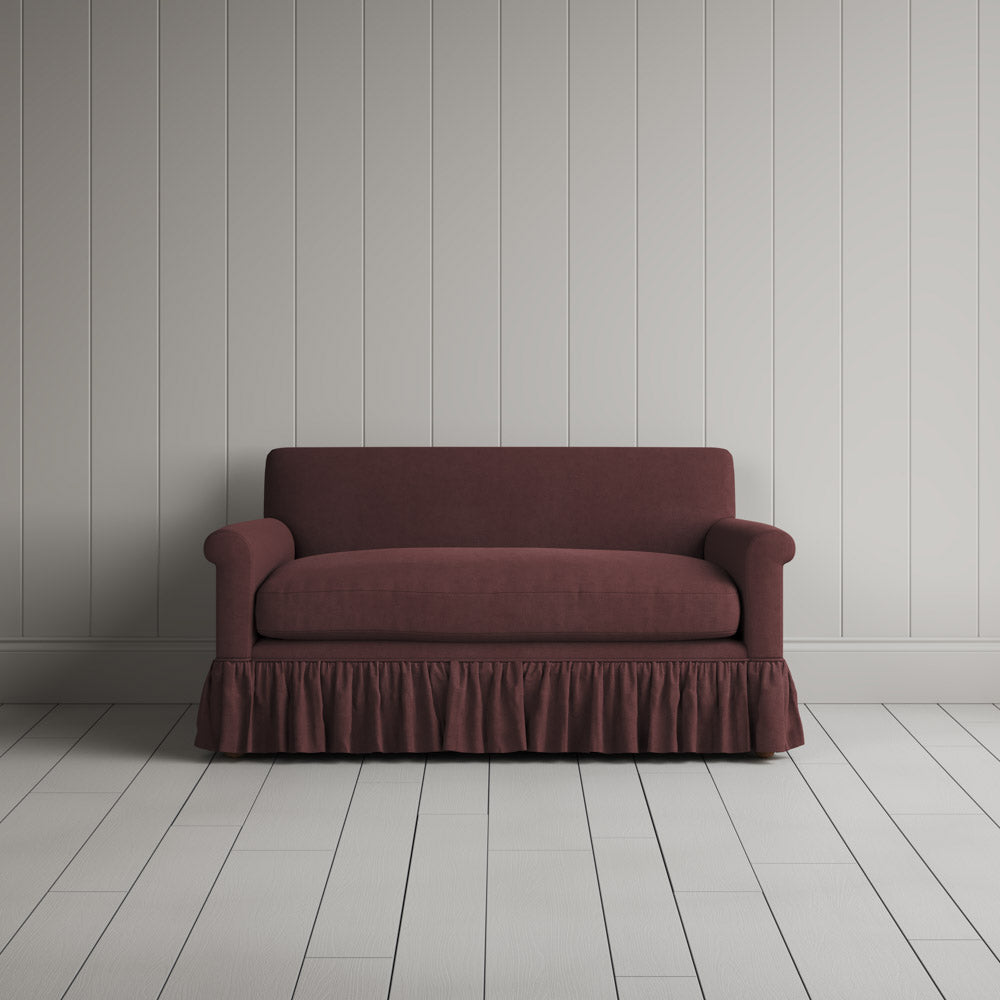  Front portrait of the Laidback Linen Curtain Call love seat by Nicola Harding interiors. 