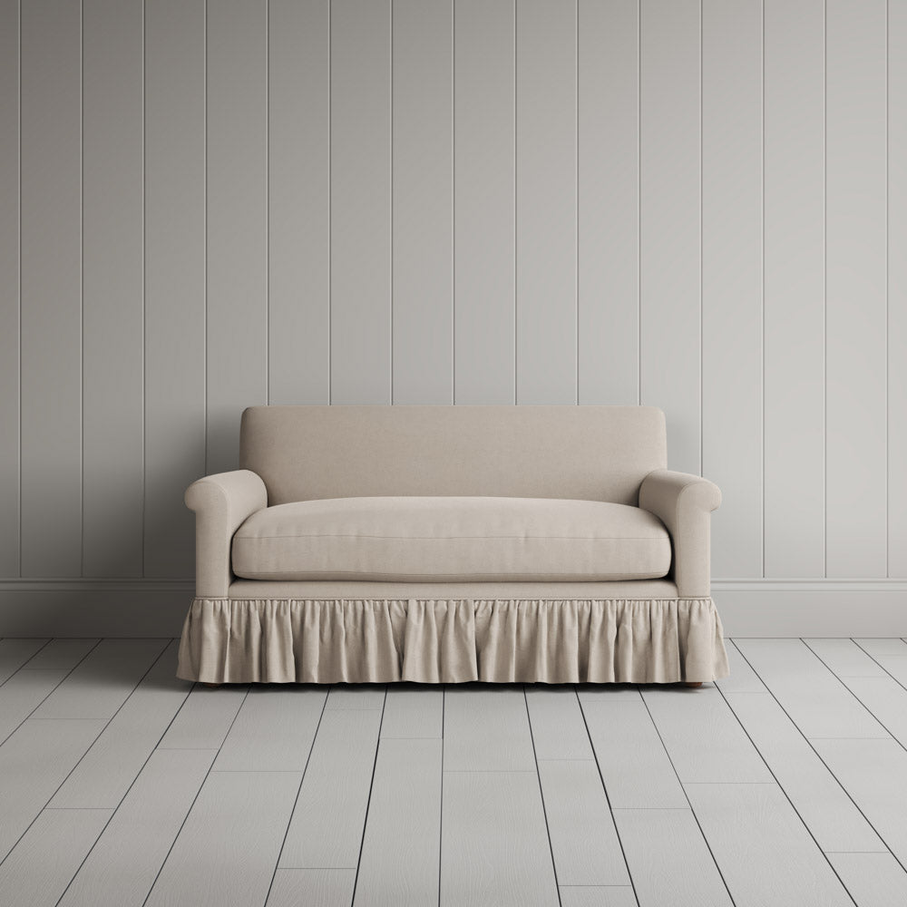  Front portrait of the Laidback Linen Curtain Call love seat by Nicola Harding interiors. 