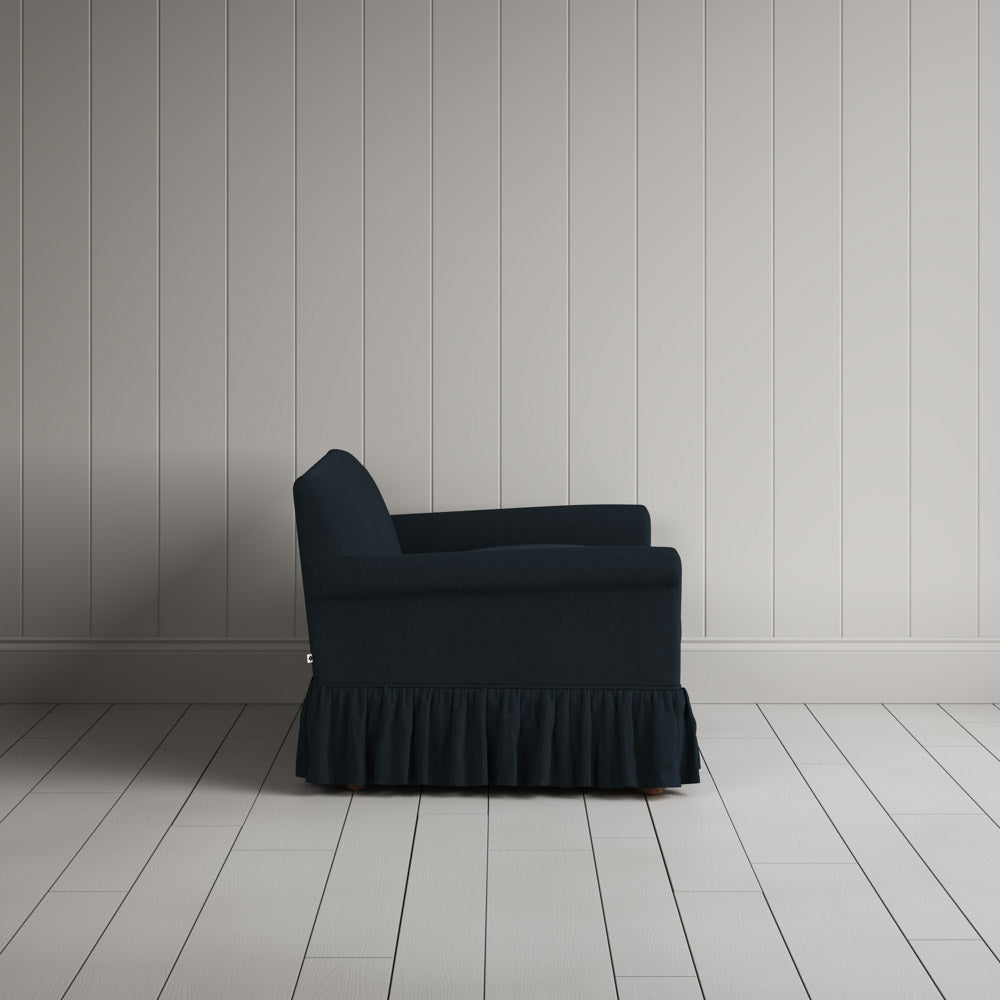  Side view showing the relaxed frame of the Curtain Call NiX interiors sofa. 