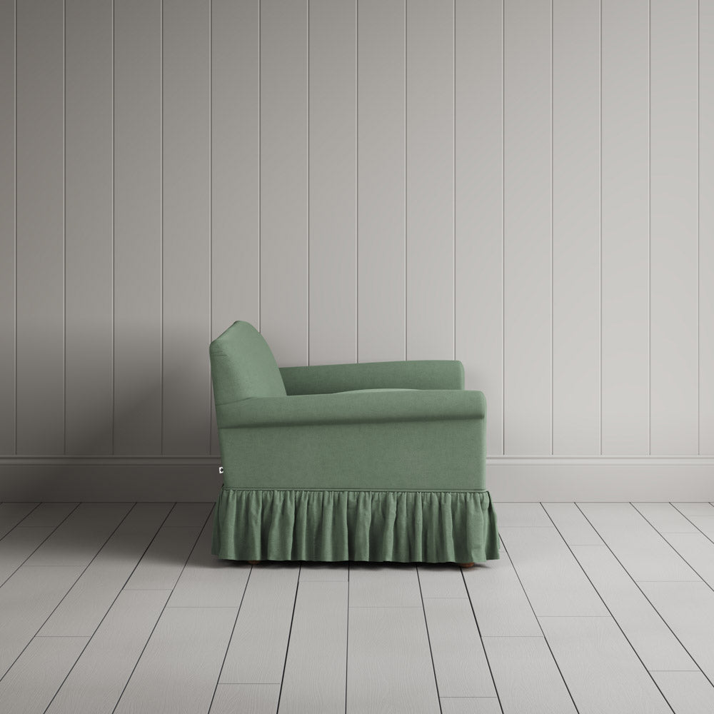 Side view showing the relaxed frame of the Curtain Call NiX interiors sofa.