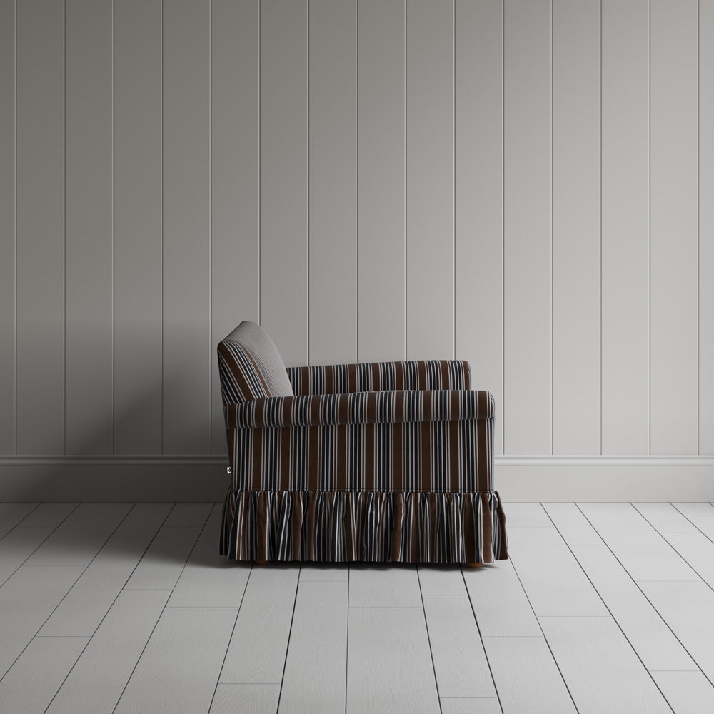  Side view showing the relaxed frame of the Curtain Call NiX interiors sofa. 