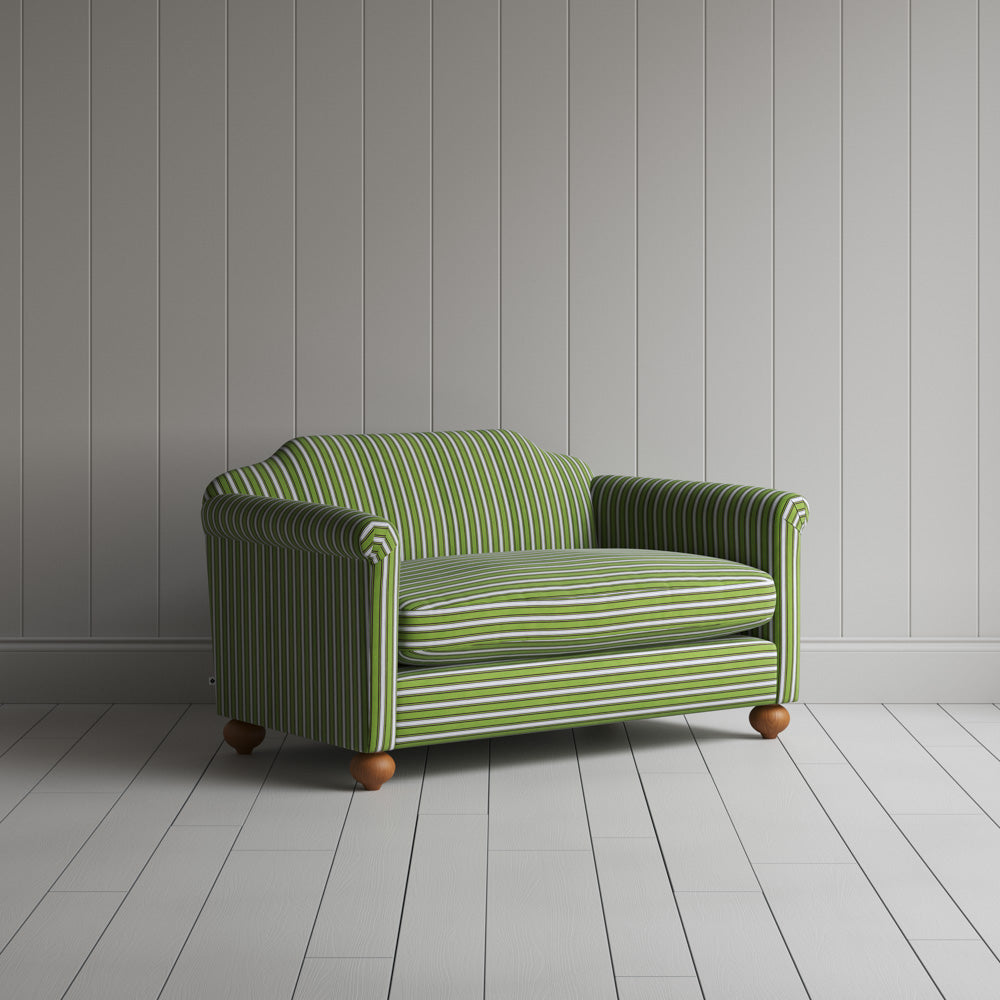  Three-quarter view of the Colonnade Cotton Green and Wine Dolittle love seat by NiX. 