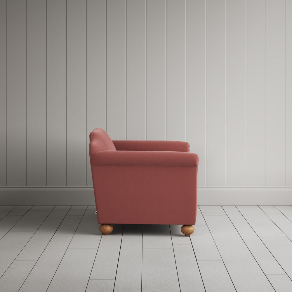  Side view showing the arched back profile of the Dolittle love seat by NiX. 