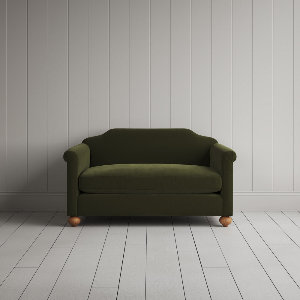 Front portrait of the juniper green Dolittle love seat by Nicola Harding interiors. 