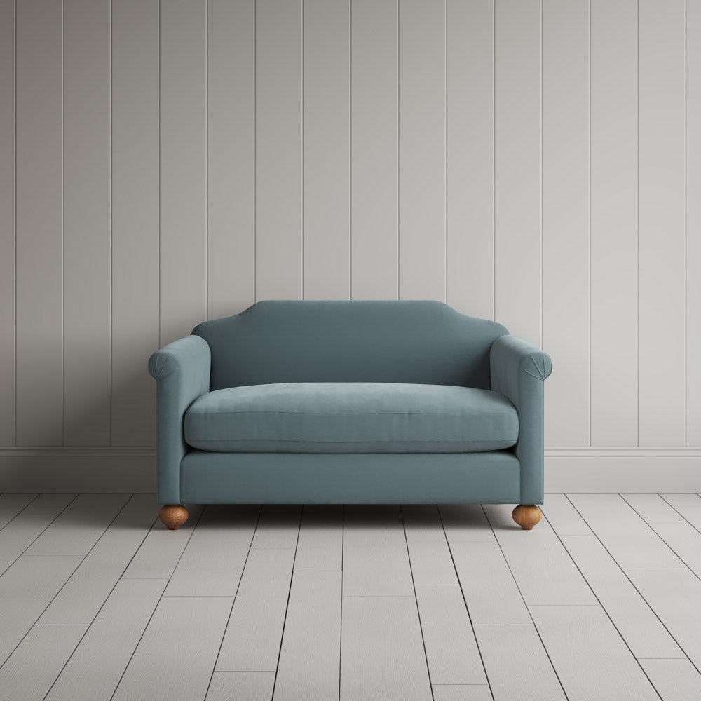  Front portrait of the light blue Dolittle love seat by Nicola Harding design. 