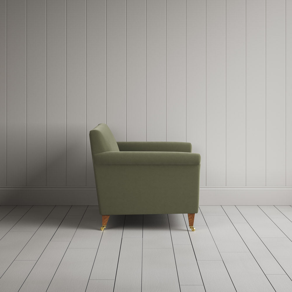  Side profile of the Velvet Green Tea Idler love seat by Nicola Harding 