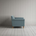 Side profile of the Velvet Mineral Idler love seat by Nicola Harding