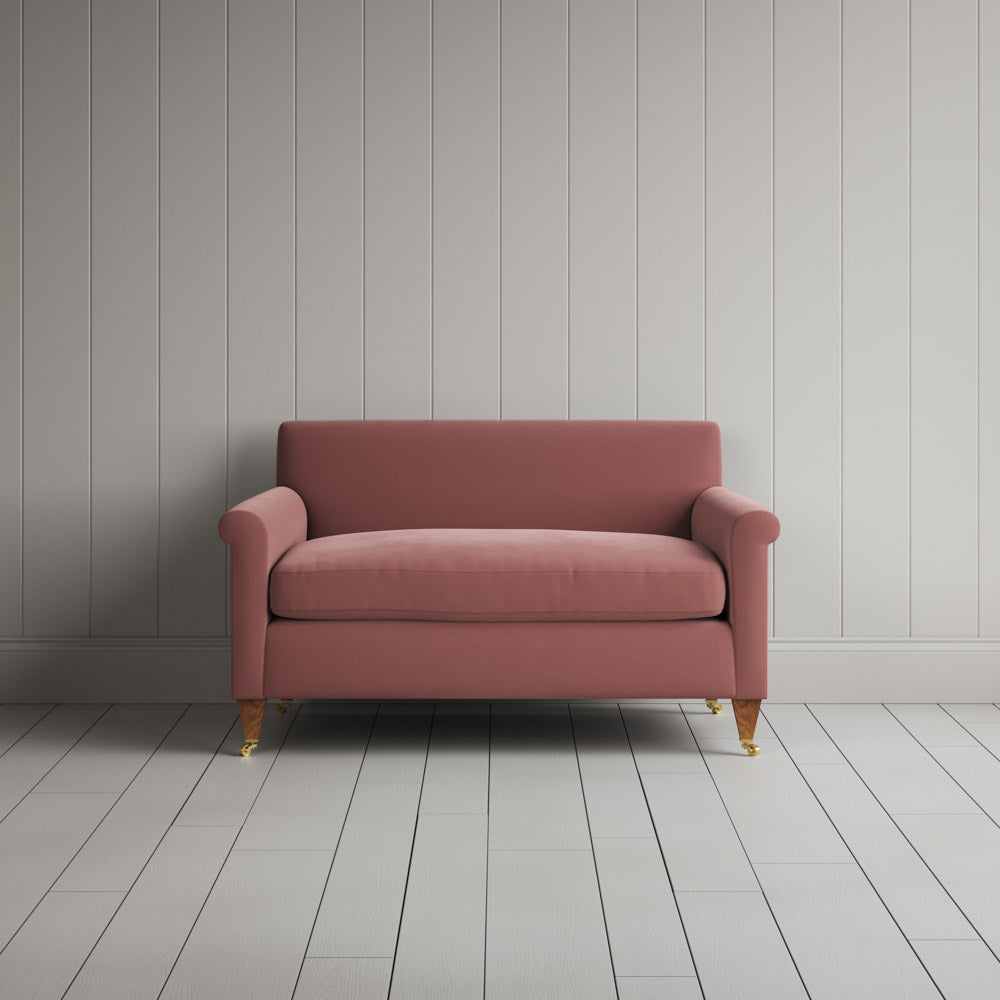  Front view of the Idler BIG LOVE seat in Rose Intelligent Velvet by Nix. 