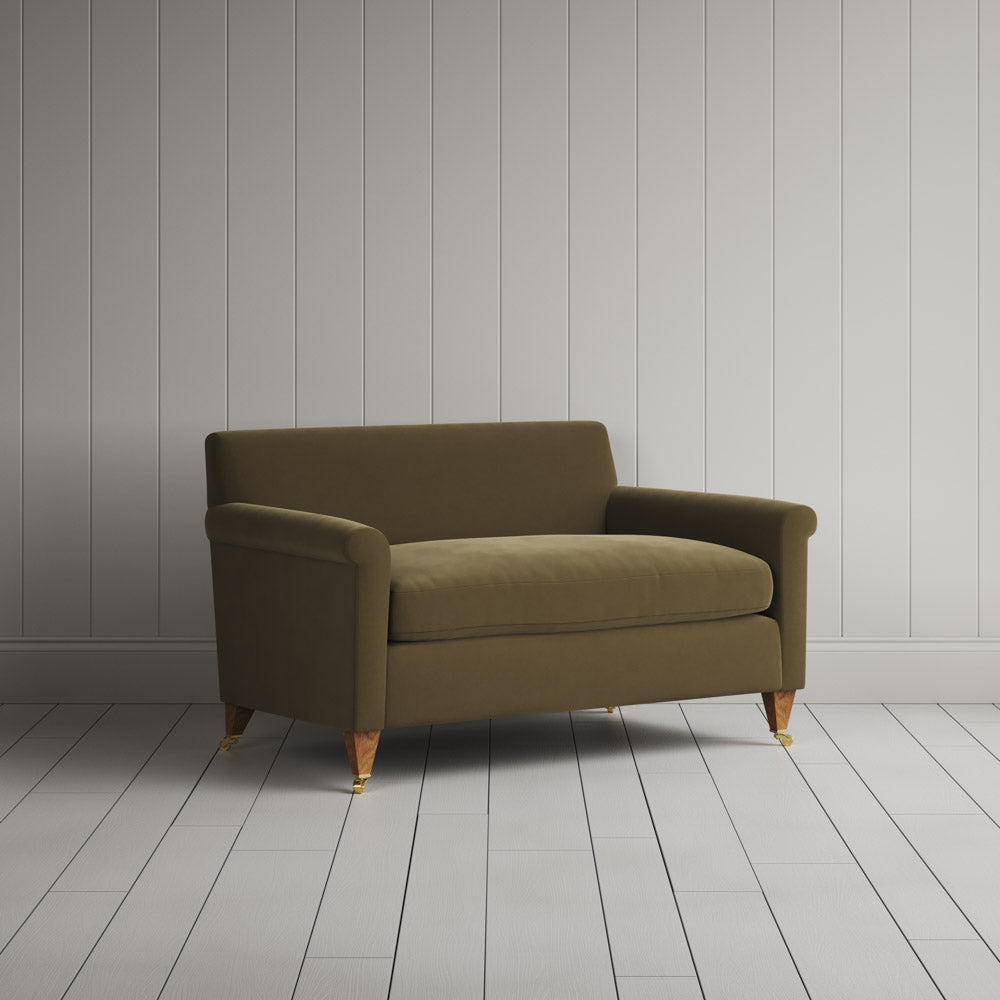 Side silhouette of the handcrafted Sepia velvet love seat by Nicola Harding.
