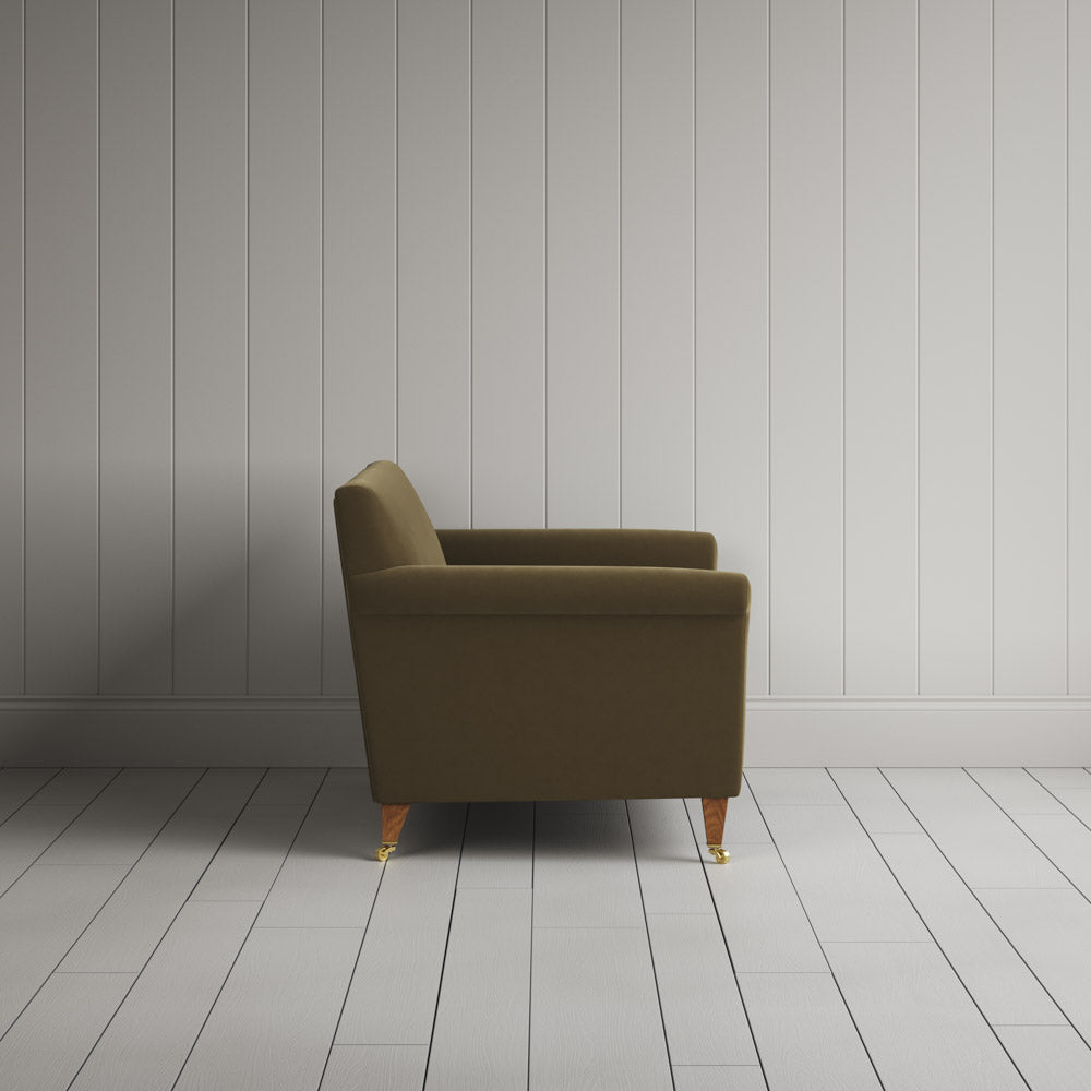 Side profile of the Idler seat in Sepia Intelligent Velvet by Nix.