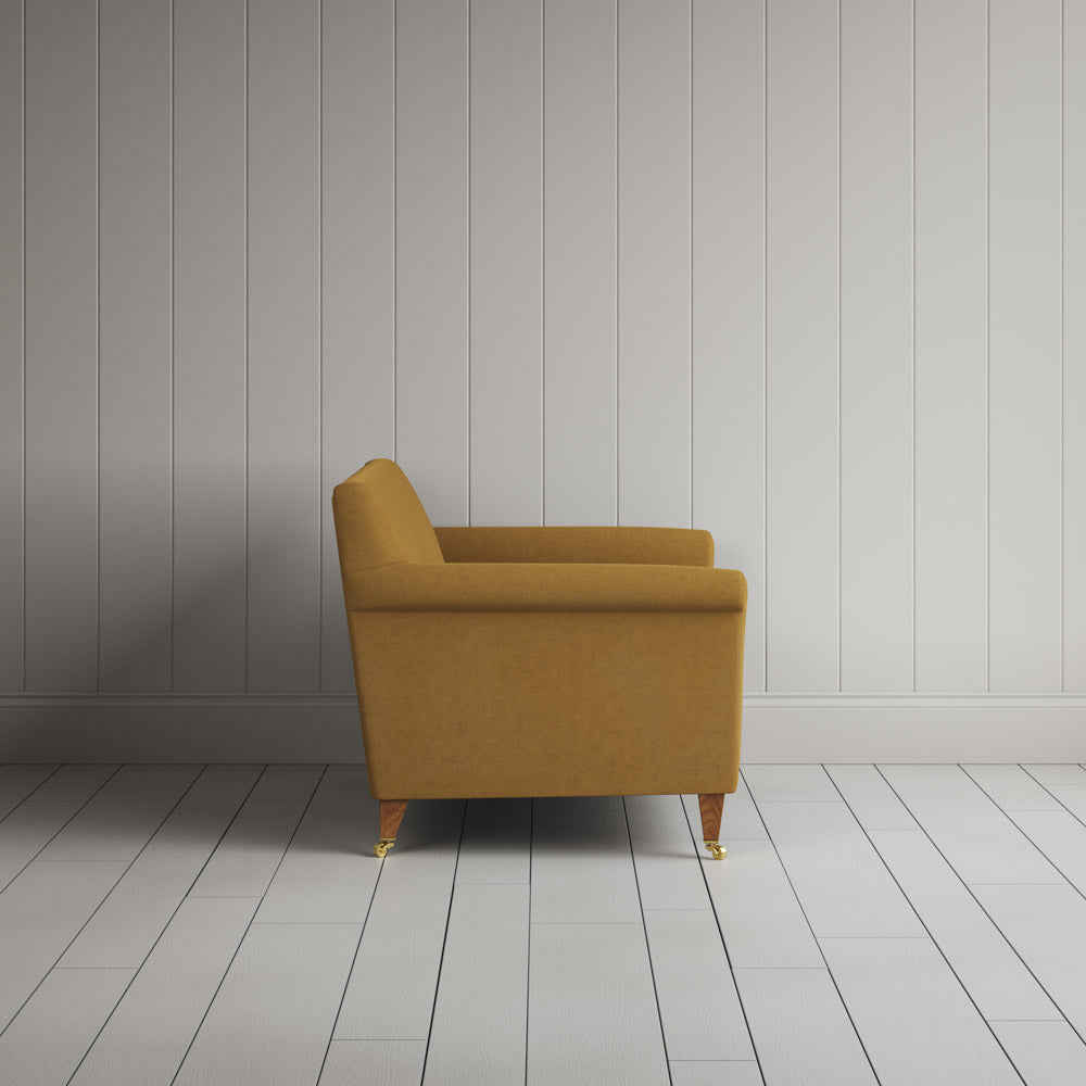  Side profile of the Idler seat in Ochre Laidback Linen by Nix. 