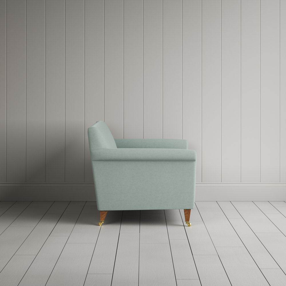  Side profile of the Idler seat in Sky Laidback Linen by Nix. 