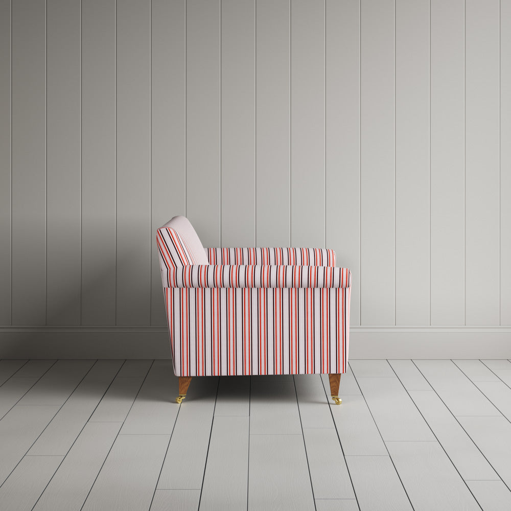  Side profile of the Idler seat in Berry Slow Lane cotton linen by Nix. 