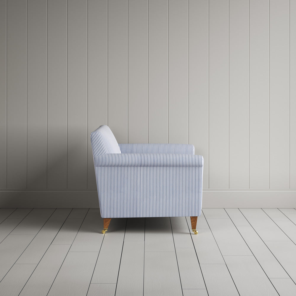 Side profile of the striped Idler love seat by Nicola Harding